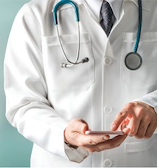 Clinician in a white coat with a stethoscope